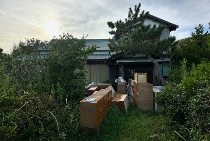 Abandoned Japanese house restoration project potential.